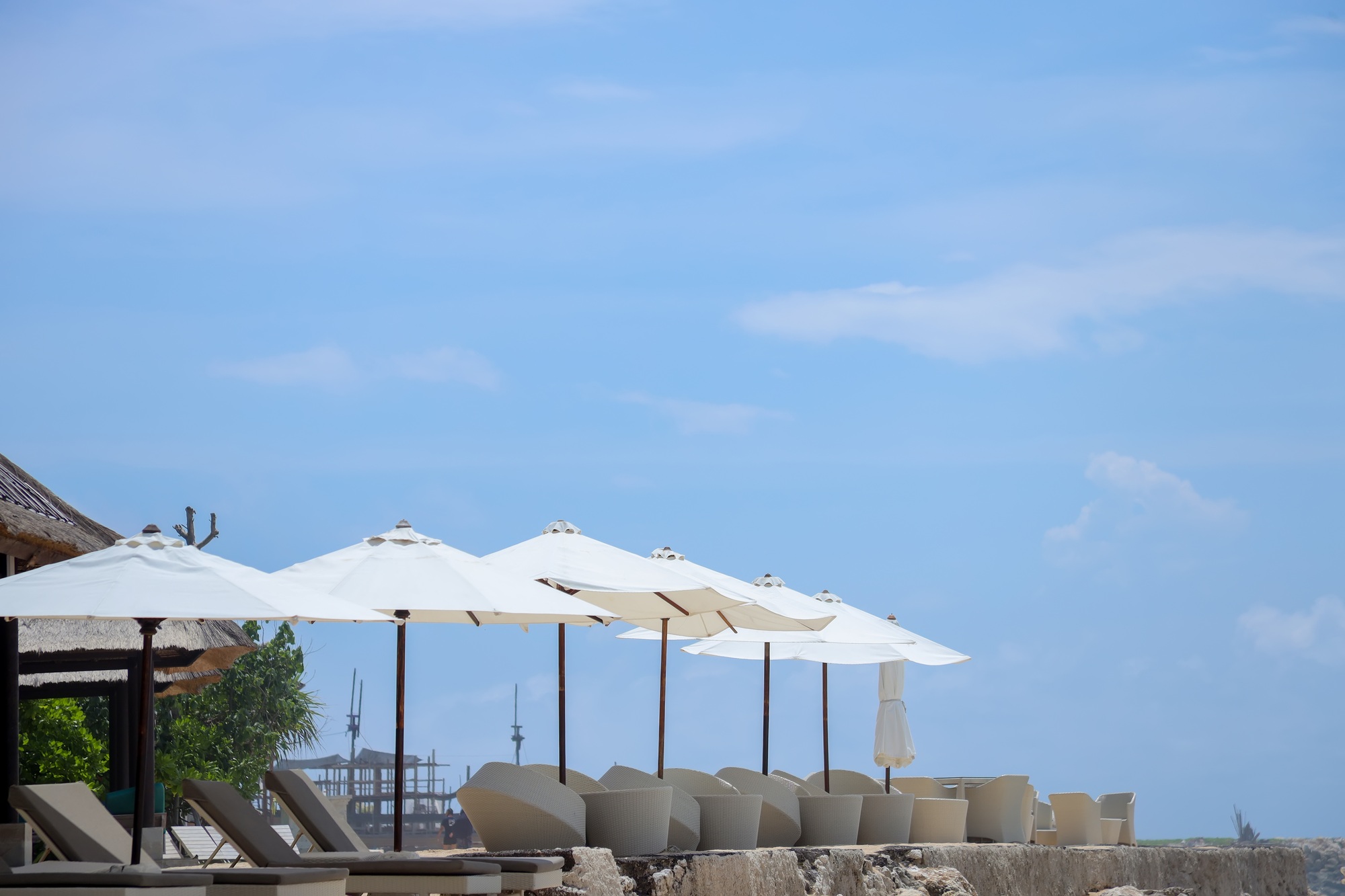 Relaxing Chairs With Umbrella On The Beach